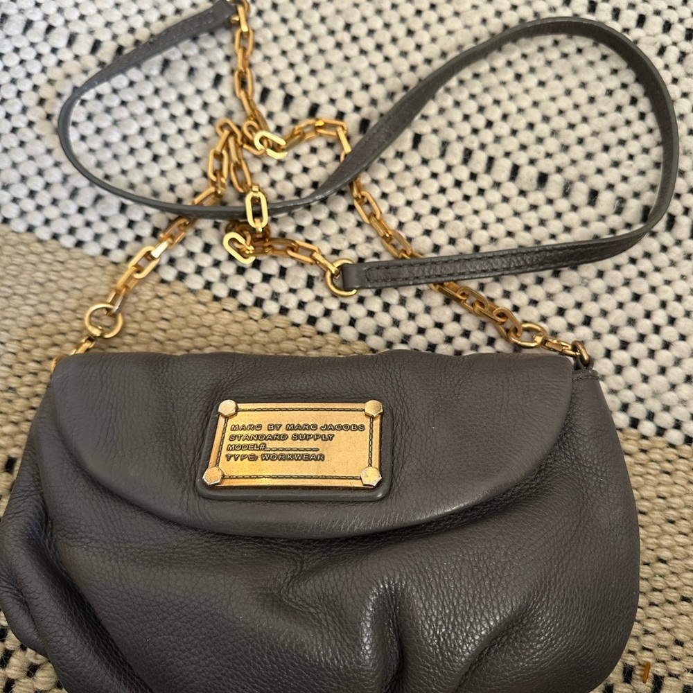 Marc by Marc Jacobs grey leather clutch with strap.